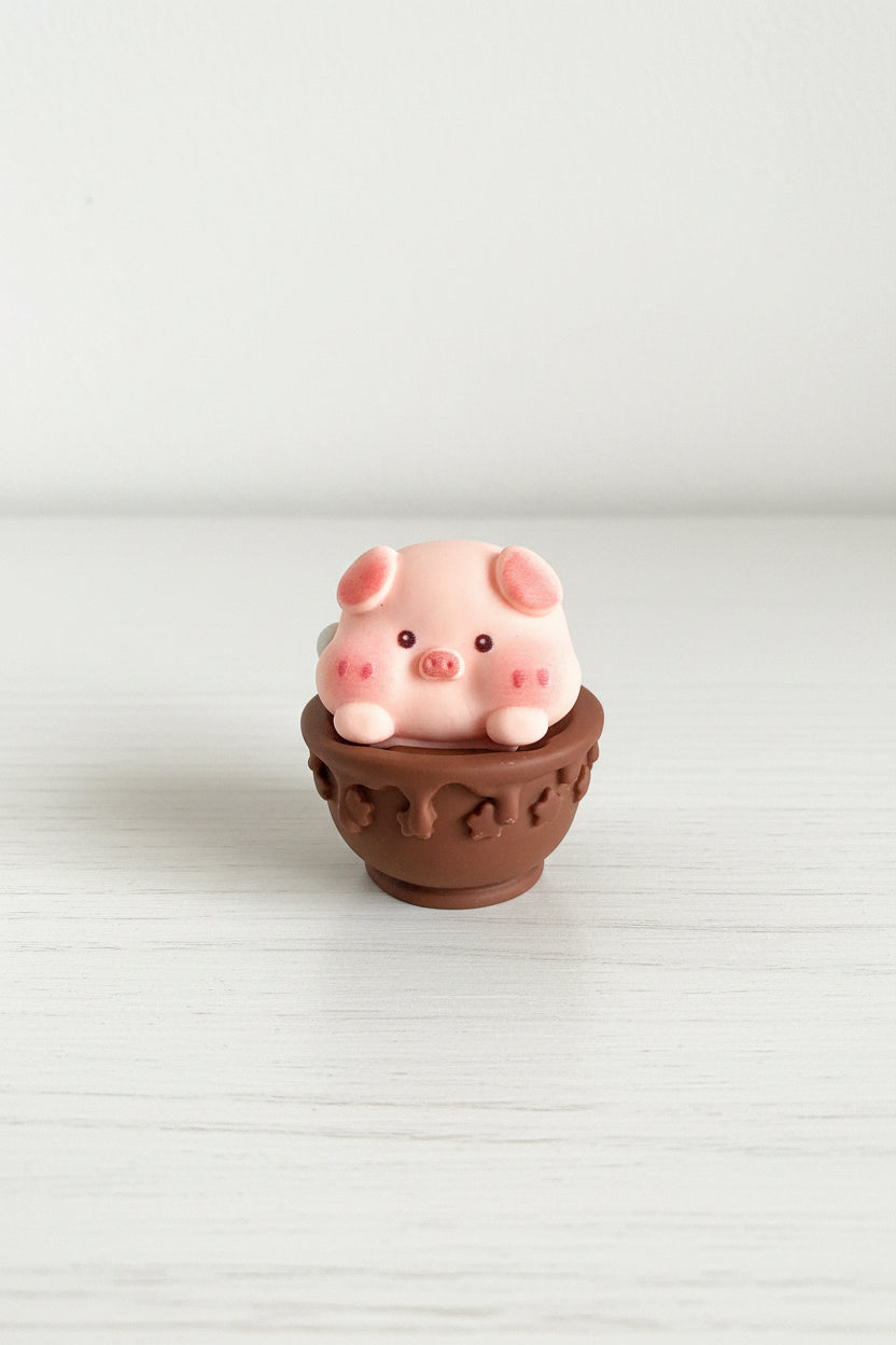 Cute pig figurine holding an Oreo biscuit craft embellishment - Kingyscrafts