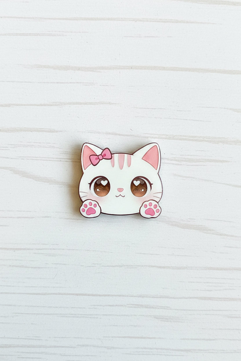 Cute acrylic kawaii cat bead with bow, heart eyes, and pink paws, for jewellery making and craft projects