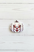Halloween silicone focal bead in pumpkin shape with spooky face and stitch detail for pen making and crafts