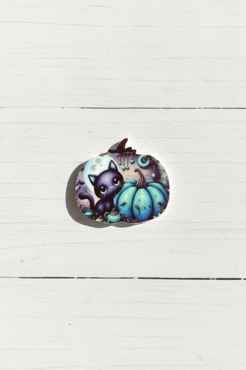 Halloween silicone focal bead in pumpkin shape with spooky face and stitch detail for pen making and crafts