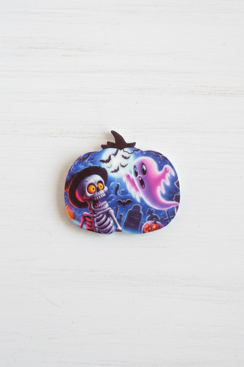 Halloween silicone focal bead in pumpkin shape with spooky face and stitch detail for pen making and crafts