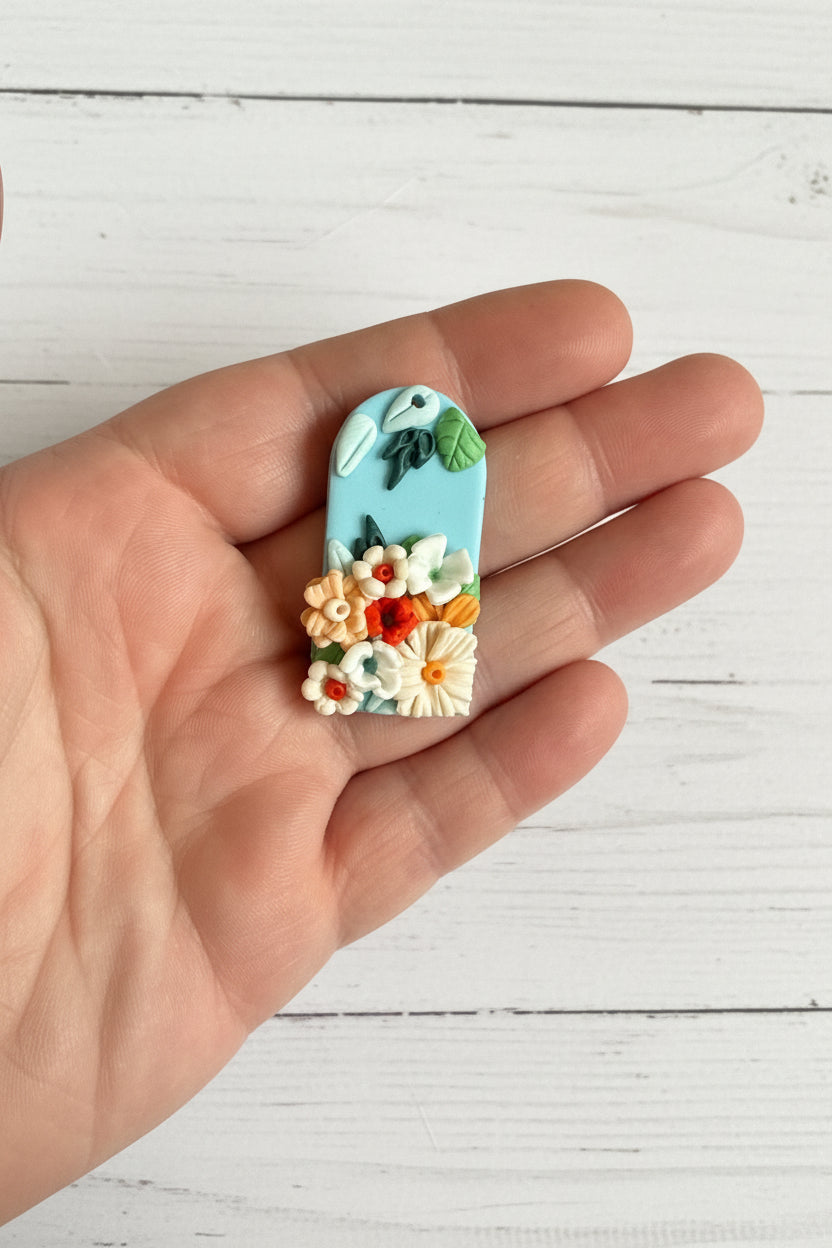 Handmade polymer clay floral pendant, lightweight and handcrafted with intricate 3D flower and leaf details, suitable for necklaces, earrings, and bag charms