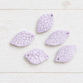 Pack of 25 pastel acrylic leaf beads.