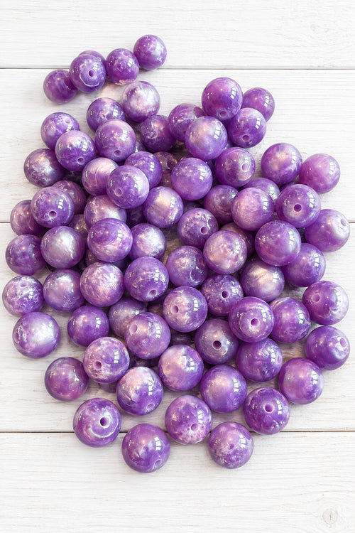 Pack of 5 pearlescent cat eye beads, 16 mm.