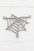 metal spider web connector with three attachment loops for jewellery making.