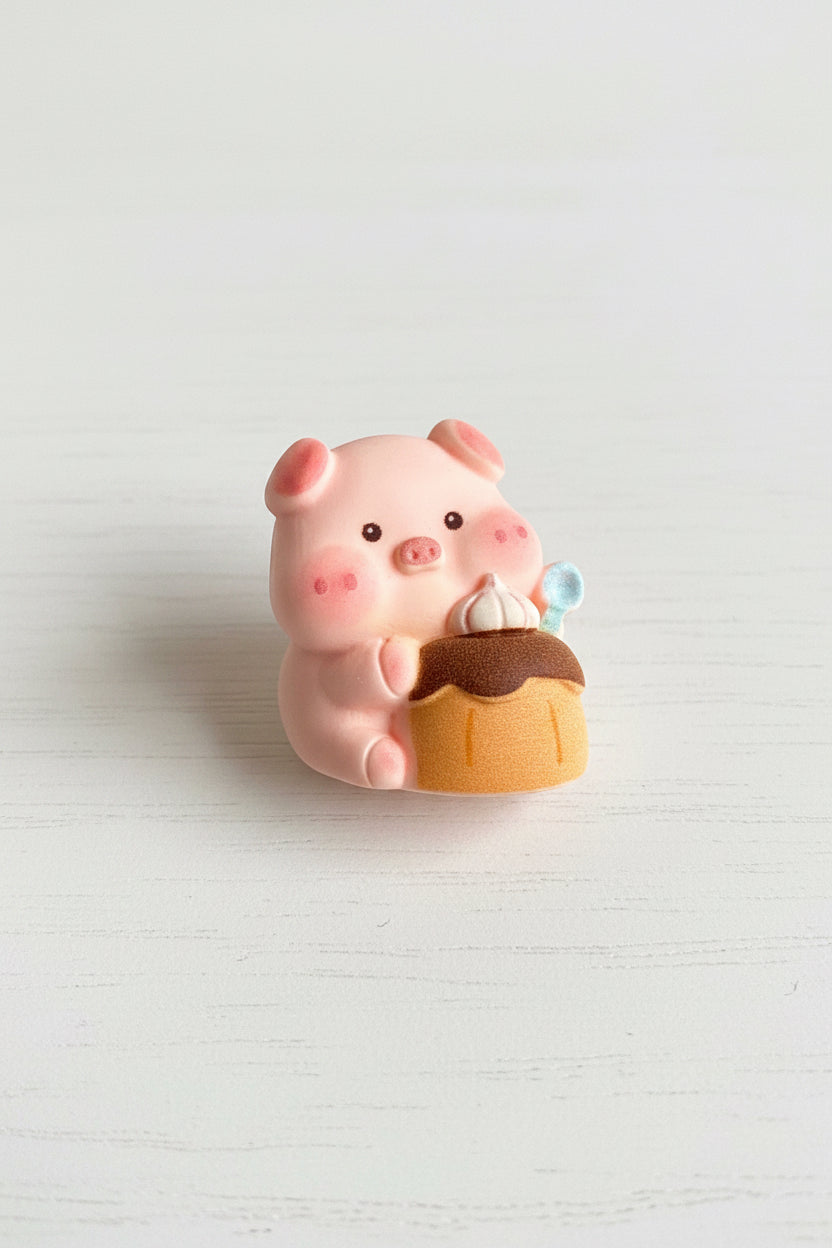 Pink pig figurine eating cake craft embellishment - Kingyscrafts