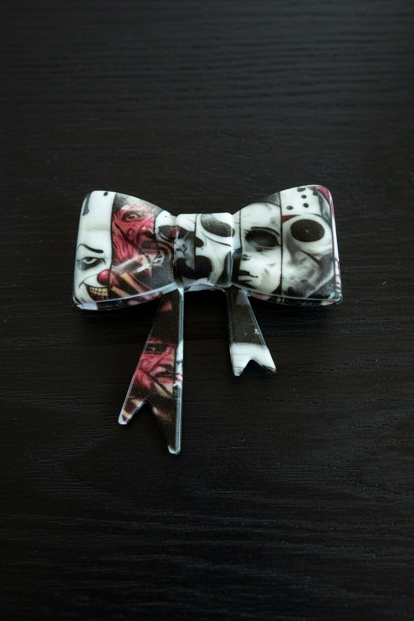 Horror silicone bow featuring Pennywise clown and Jason Voorhees mask design for jewellery making - Kingyscrafts