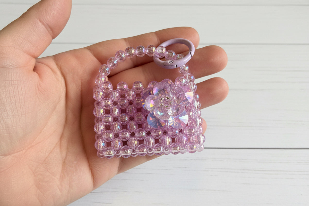 Handmade beaded bag charm with glass flower and keychain clasp