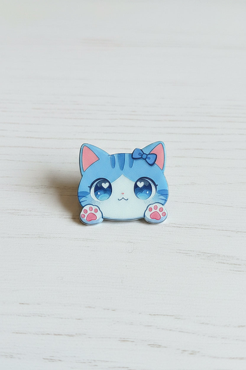 Cute acrylic kawaii cat bead with bow, heart eyes, and pink paws, for jewellery making and craft projects