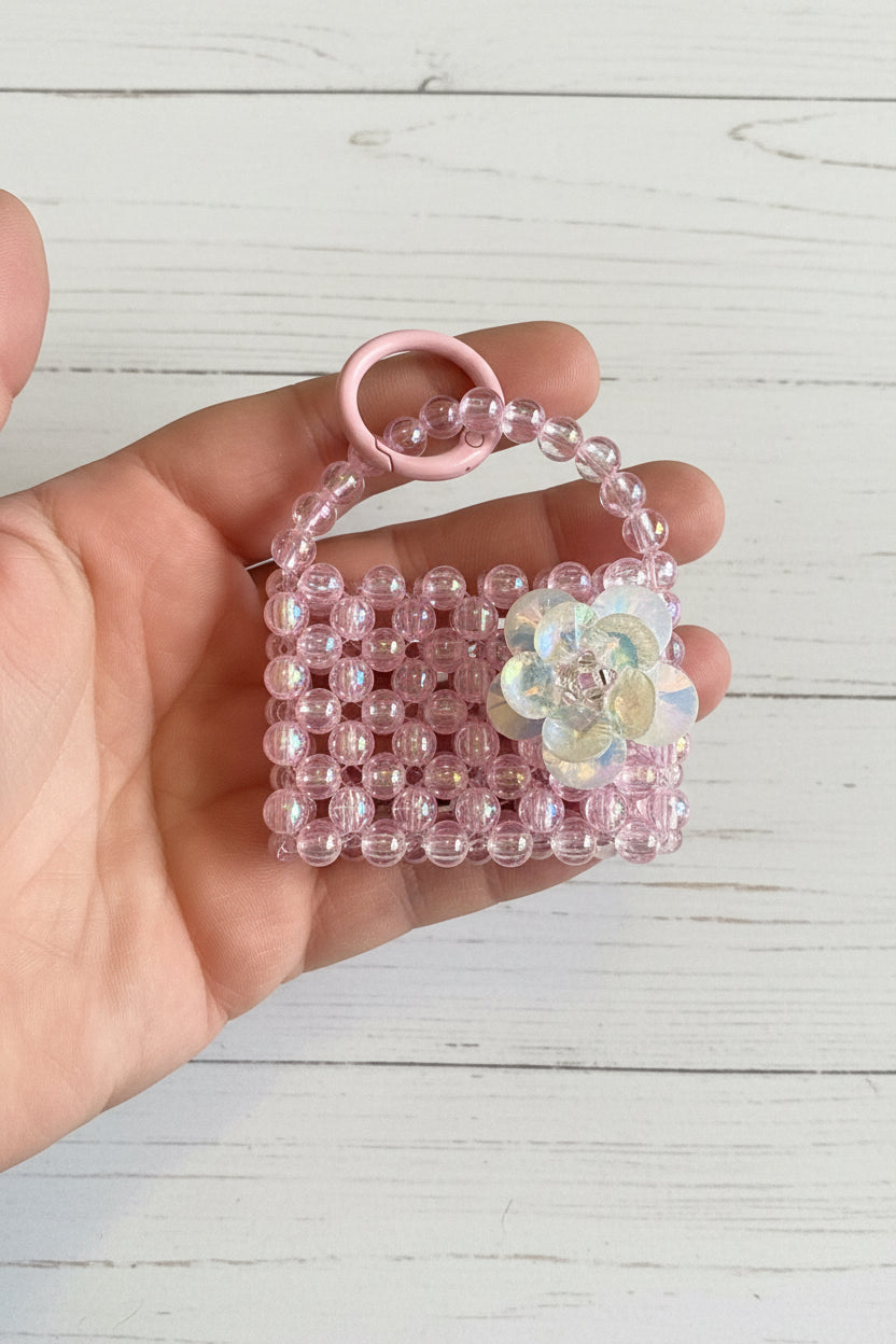 Handmade beaded bag charm with glass flower and keychain clasp