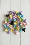 Large bell flower shaped beads in mixed pastel colours including lilac, yellow, pink, blue, green and black for jewellery making