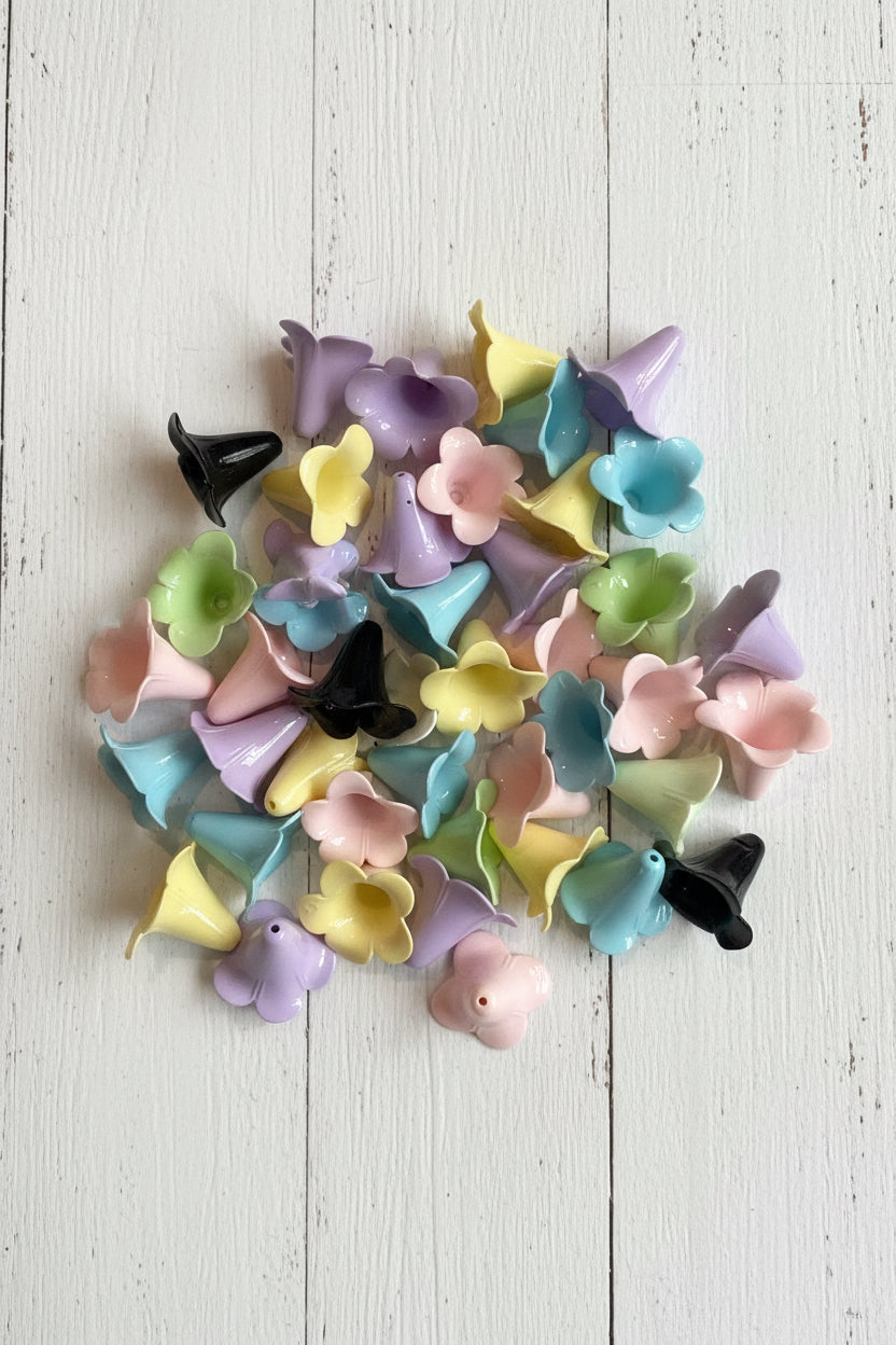Large bell flower shaped beads in mixed pastel colours including lilac, yellow, pink, blue, green and black for jewellery making