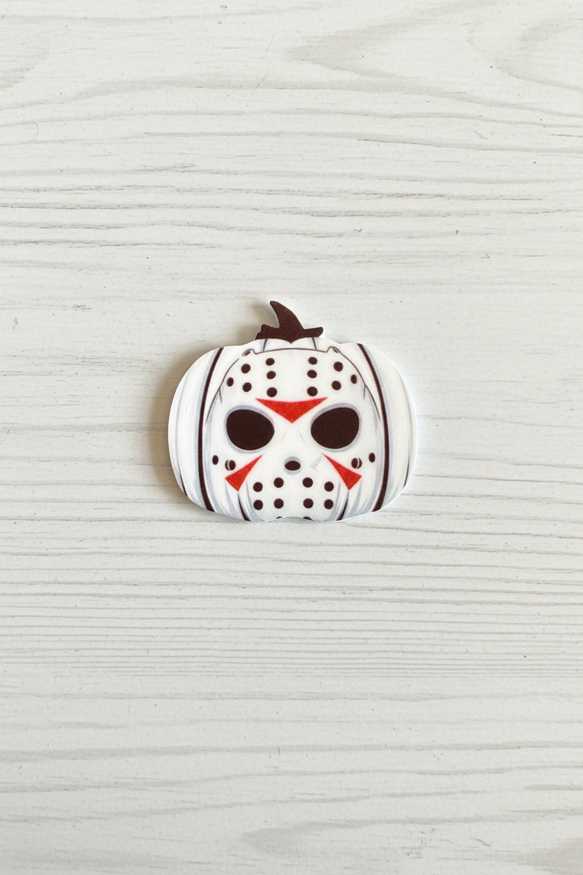 Halloween silicone focal bead in pumpkin shape with spooky face and stitch detail for pen making and crafts