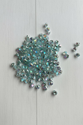 7mm Light Blue AB zircons - 5g