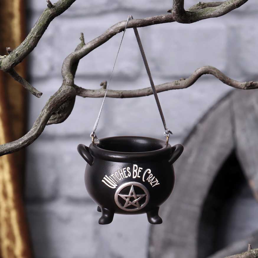Black cauldron hanging ornament with silver “Witches Be Crazy” lettering and a pentagram.