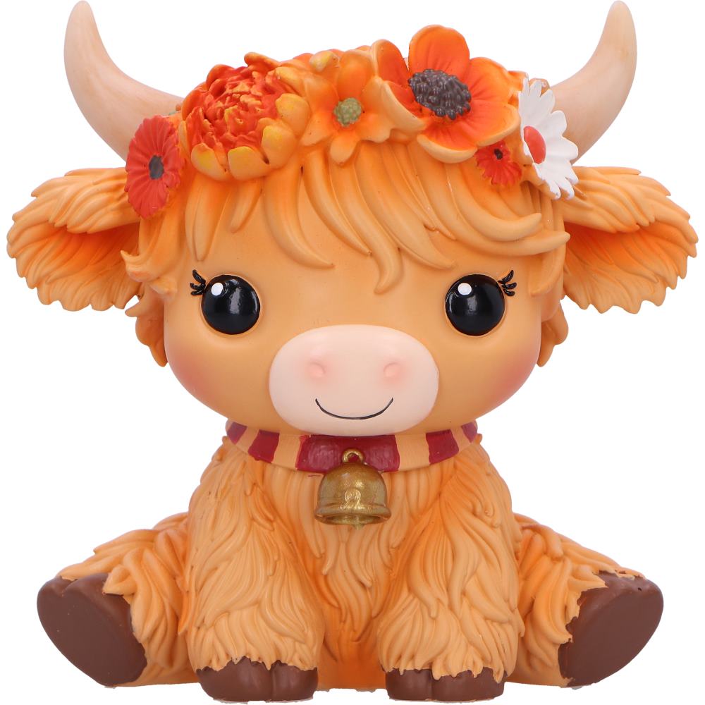 Moo Crew Marigold orange cow figurine with a flower crown and bell collar, displayed among autumn flowers.