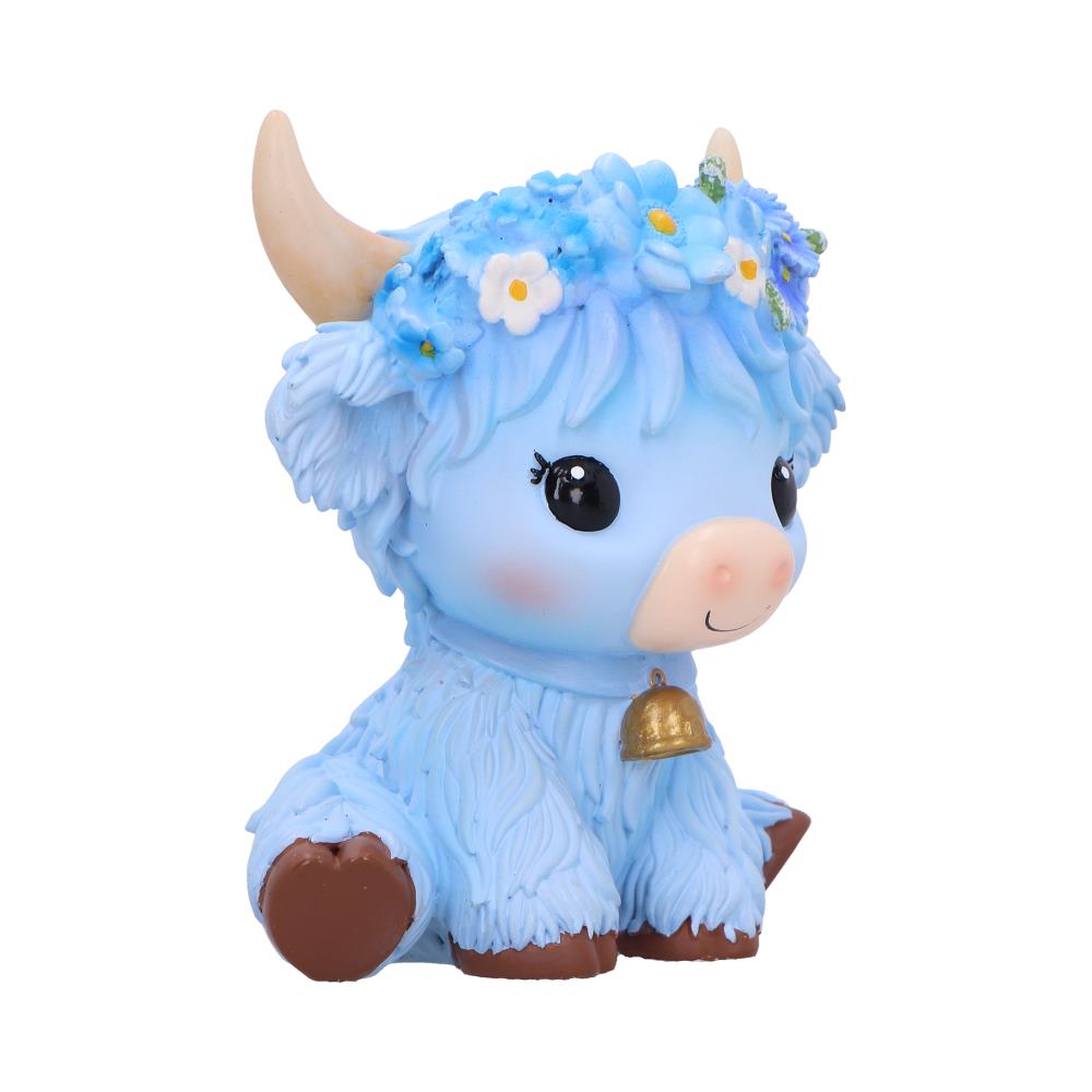 Moo Crew Bluebell blue cow figurine with a blue and white floral crown and gold bell, displayed among blue flowers