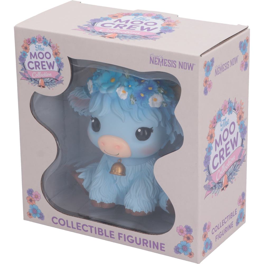 Moo Crew Bluebell blue cow figurine with a blue and white floral crown and gold bell, displayed among blue flowers