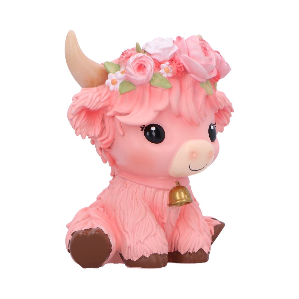 Moo Crew Primrose pink cow figurine with a pink rose crown and gold bell, displayed among pink flowers.