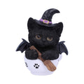 Kit-tea black cat figurine wearing a witch’s hat with bat wings, holding a broomstick in a white paw-print teacup.