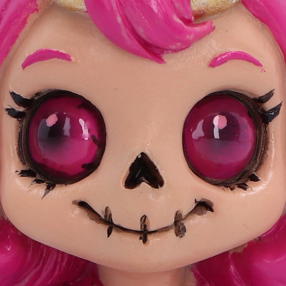 Spirit Fairy Beatrix figurine with pink hair, purple wings, small horns and a skull-style face.
