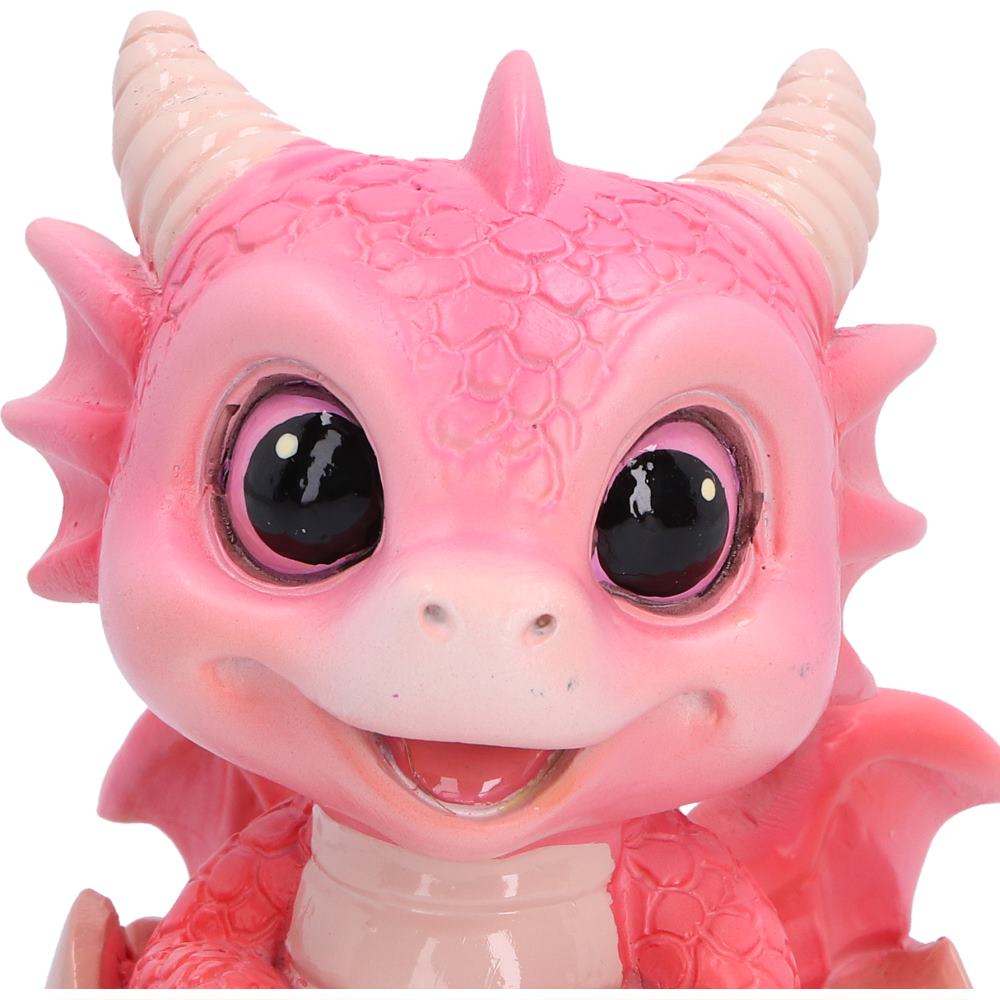 Shellbound pink dragon figurine emerging from a cracked egg.